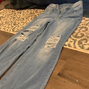 Medium long bottom ripped jeans